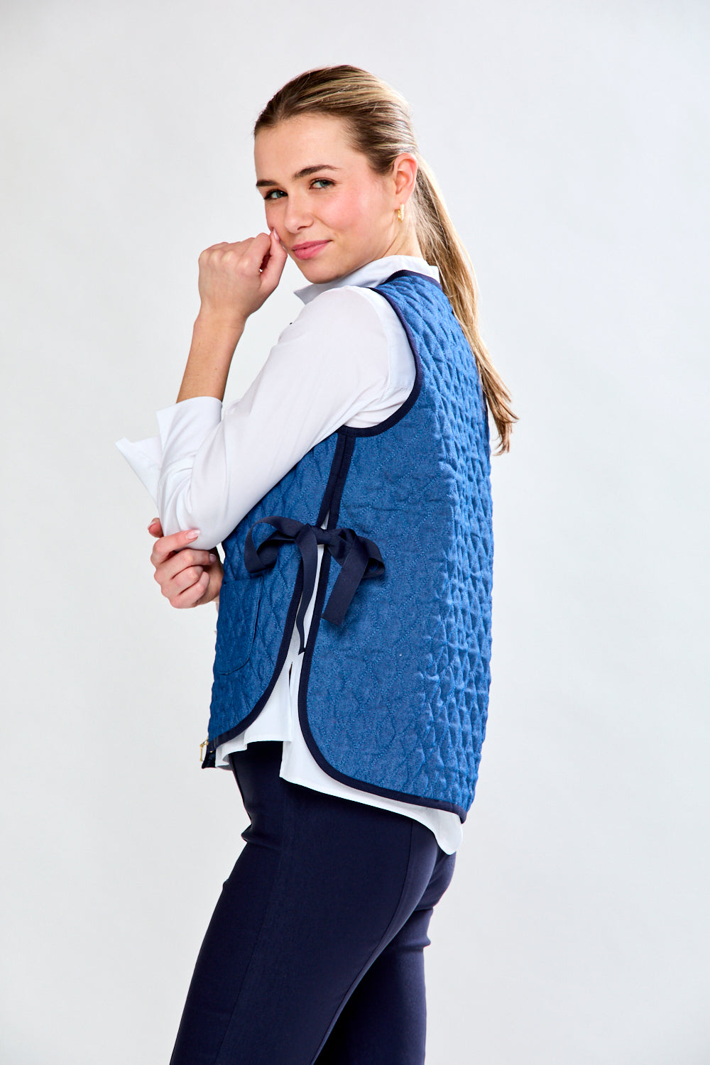 Woman in quilted vest