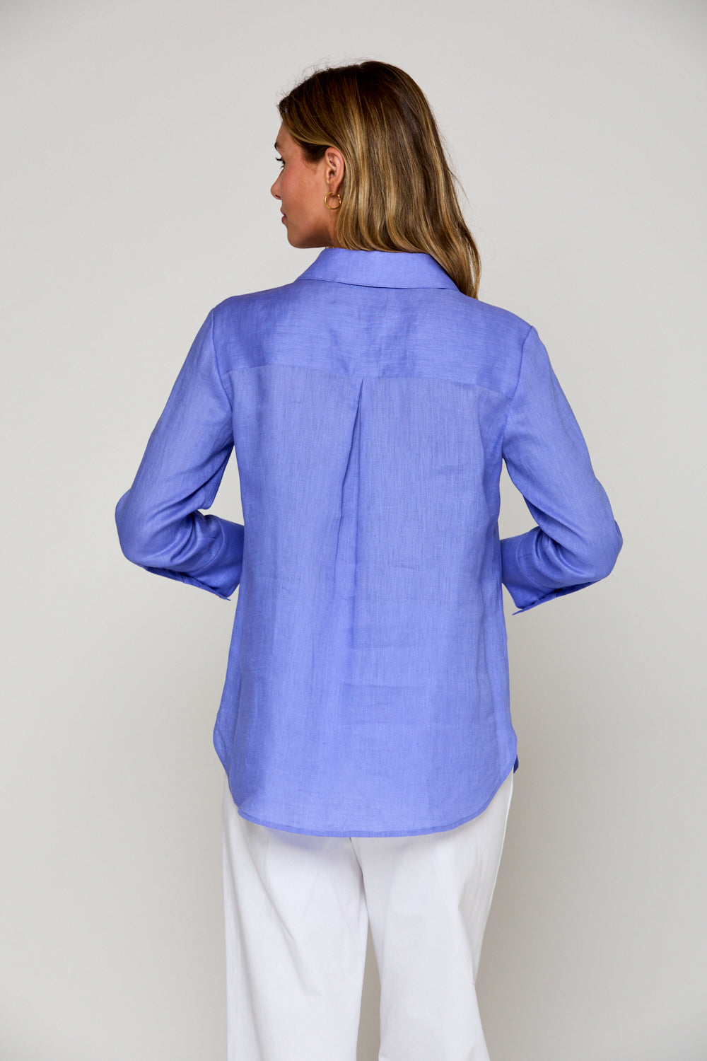 Woman in periwinkle blouse