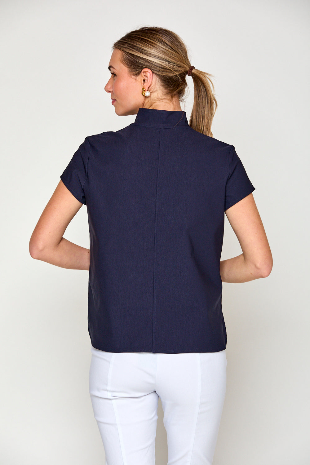 Woman in navy blouse