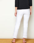 Woman in fitted white pants