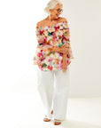 Woman in floral mo blouse