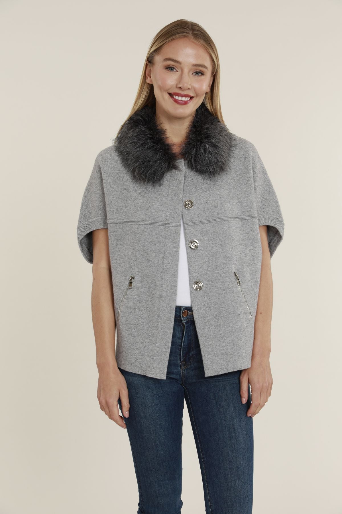Woman in grey faux fur sweater