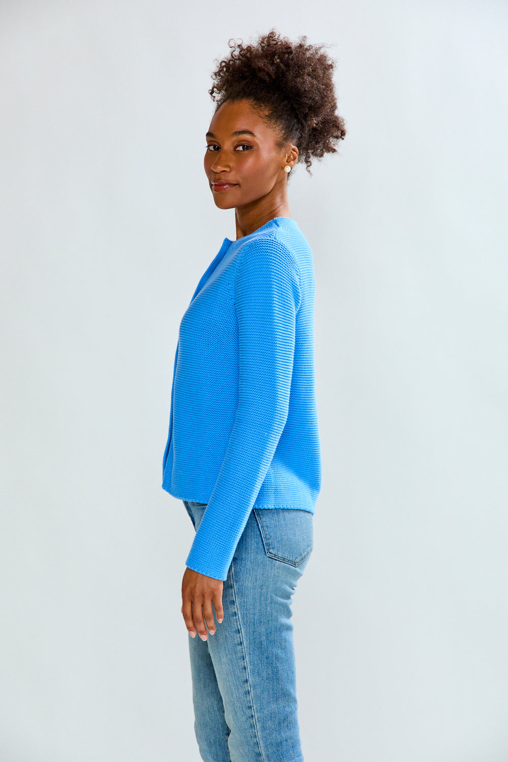 woman in periwinkle sweater