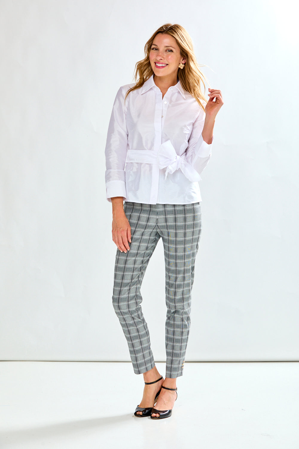 Woman wearing plaid pants 