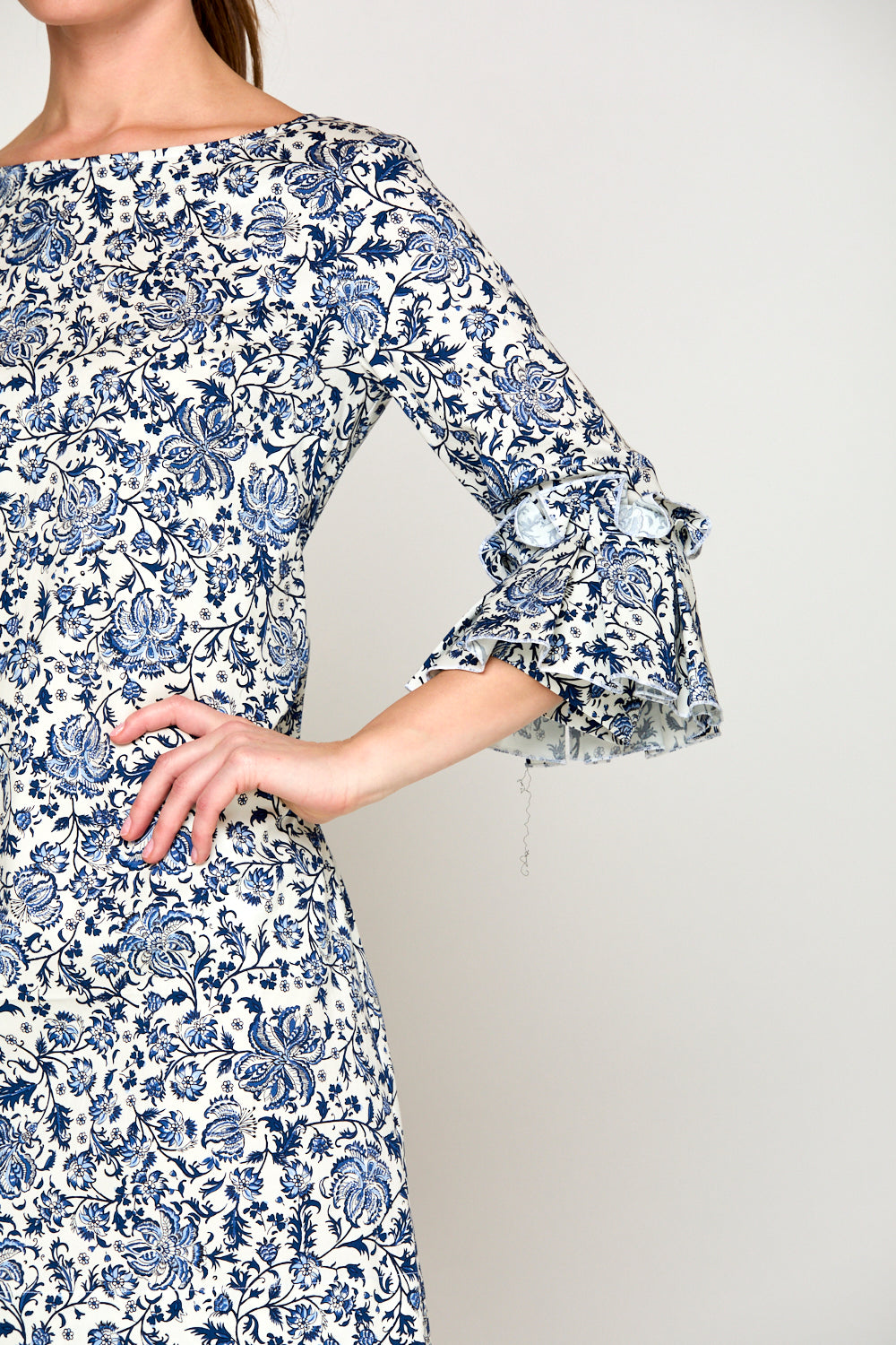 Woman in blue floral dress