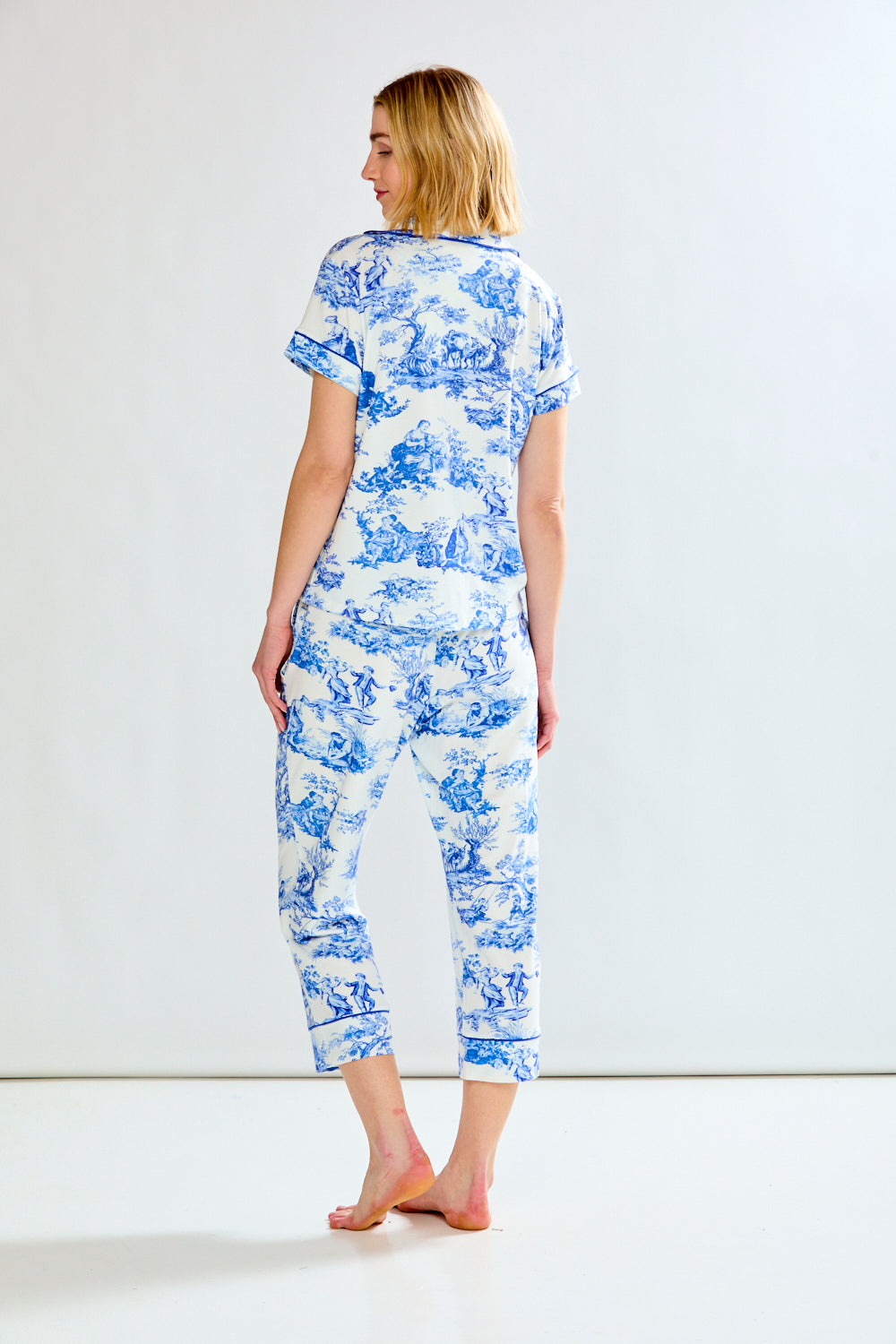 Woman in blue toile pajamas