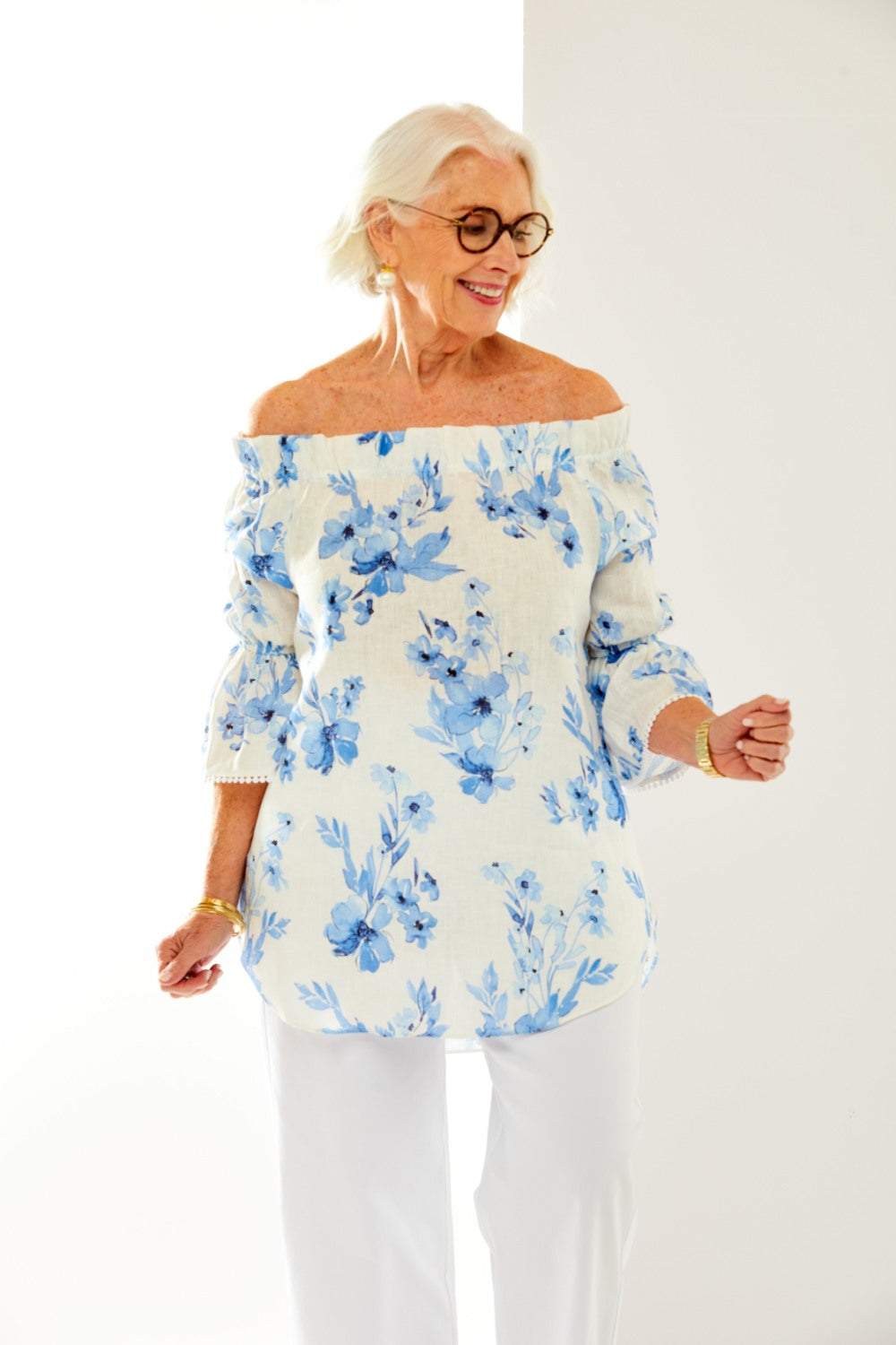 Woman in blue floral blouse