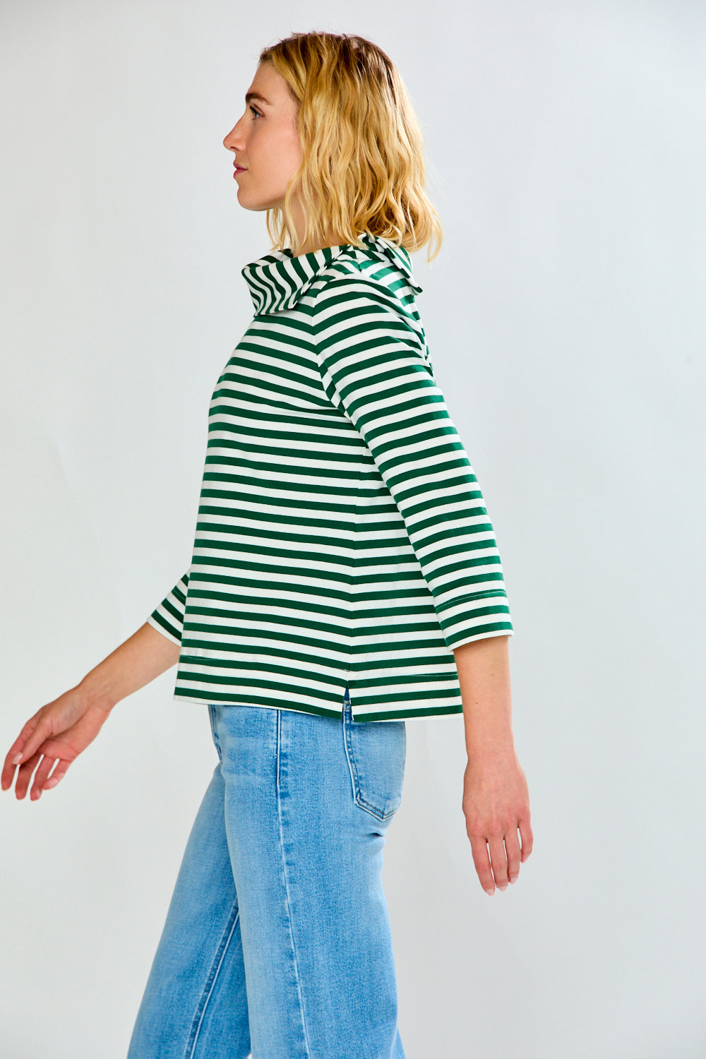 Woman in green striped top
