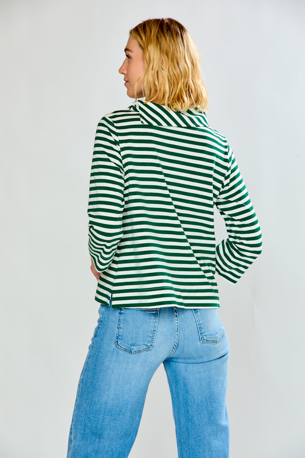 Woman in green striped top