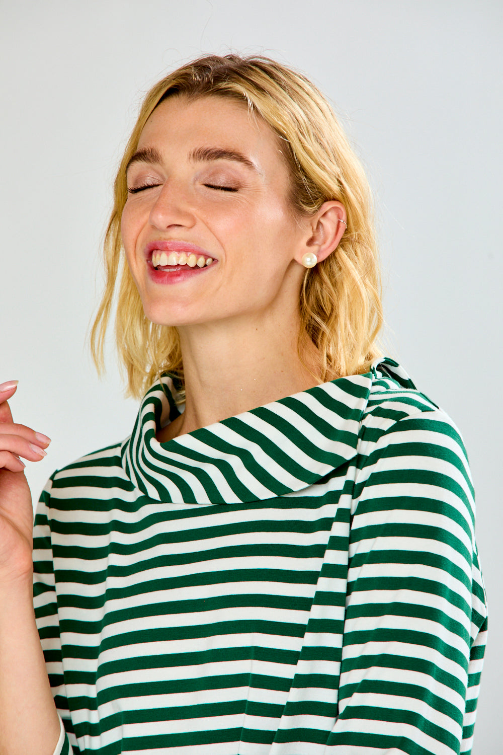 Woman in green striped top