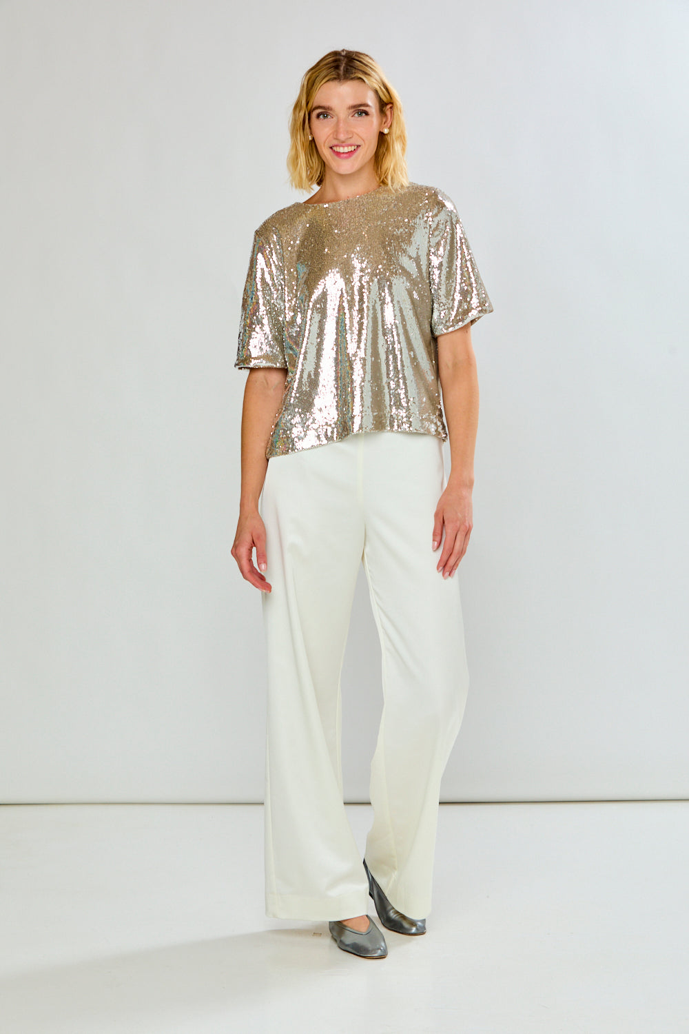 The Reyna Pant - Off White women's pants with a straight leg silhouette styled with a shimmering top for a polished sophisticated look