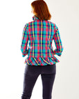 Woman in plaid top
