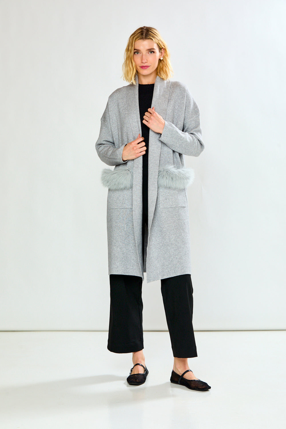 The Knit Cardigan with Sleeves, Pockets with a Faux Fur Trim