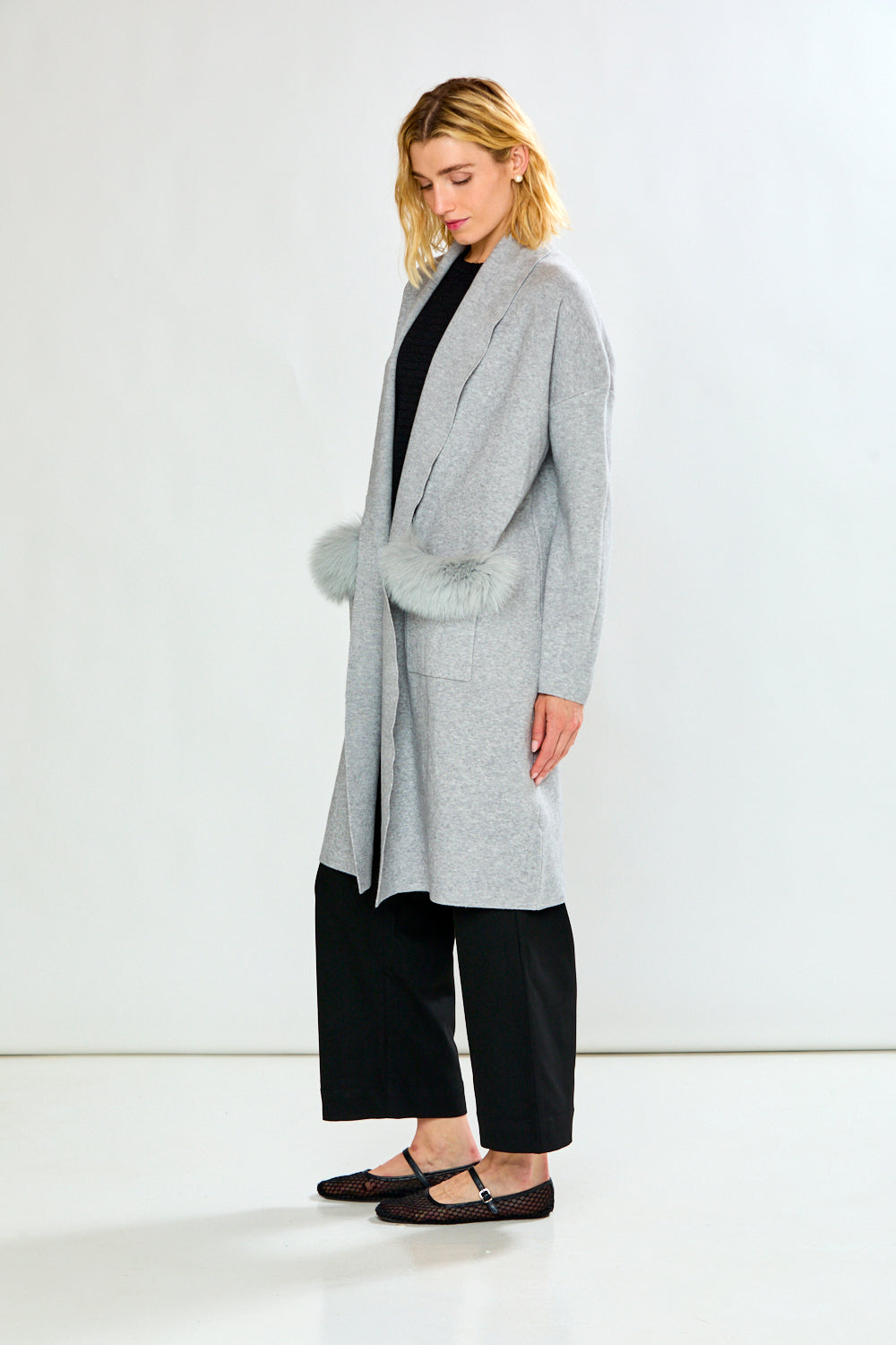 The Knit Cardigan with Sleeves, Pockets with a Faux Fur Trim