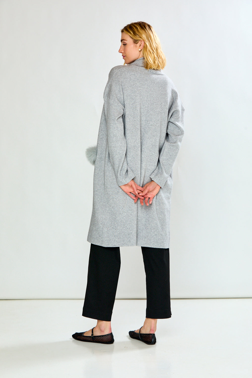 The Knit Cardigan with Sleeves, Pockets with a Faux Fur Trim