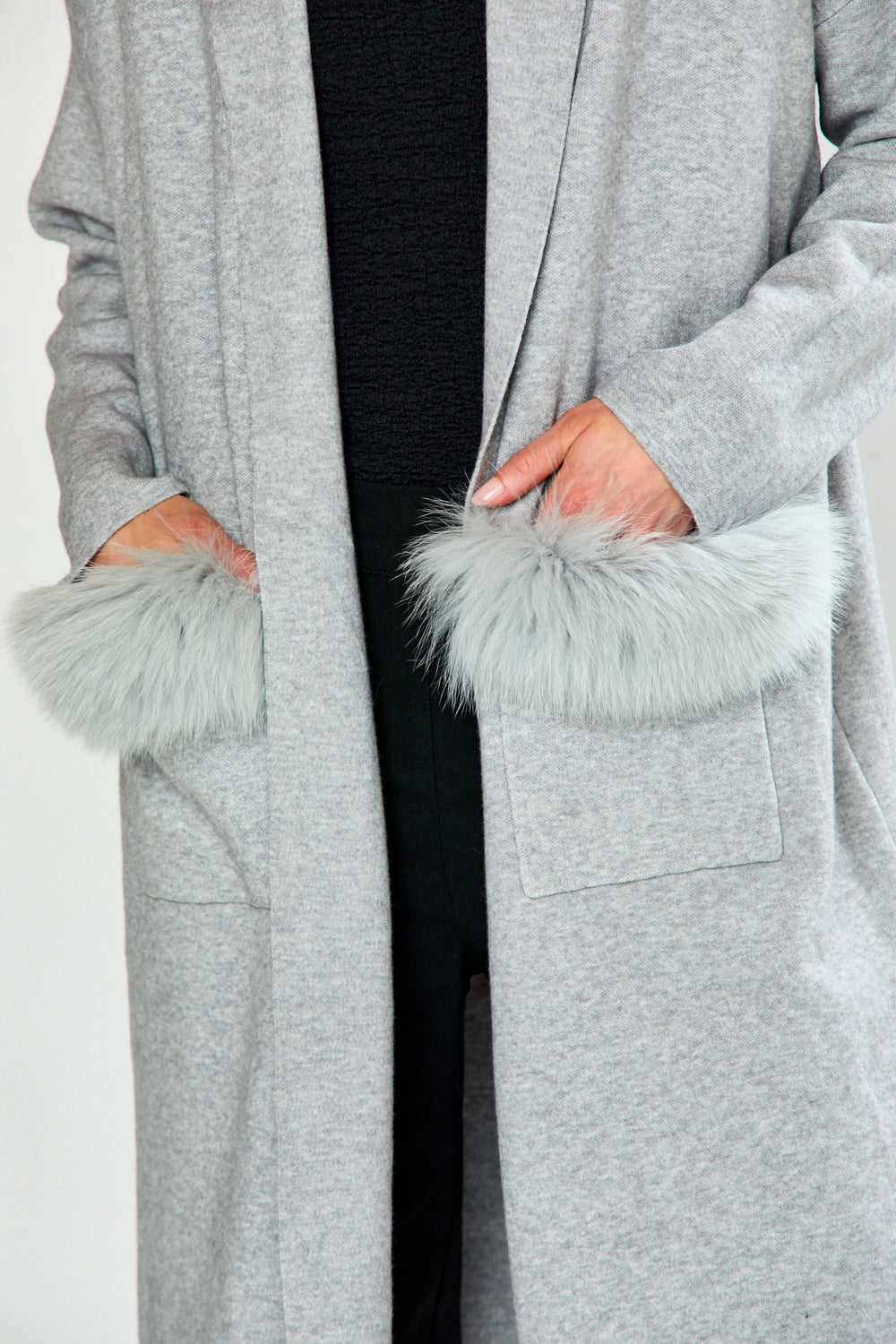 The Knit Cardigan with Sleeves, Pockets with a Faux Fur Trim