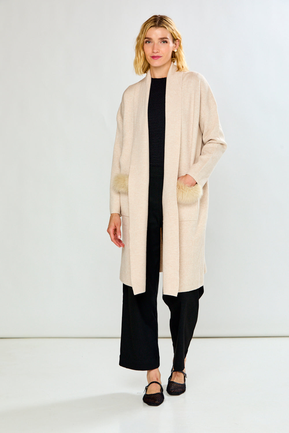 The Knit Cardigan with Sleeves, Pockets with a Faux Fur Trim