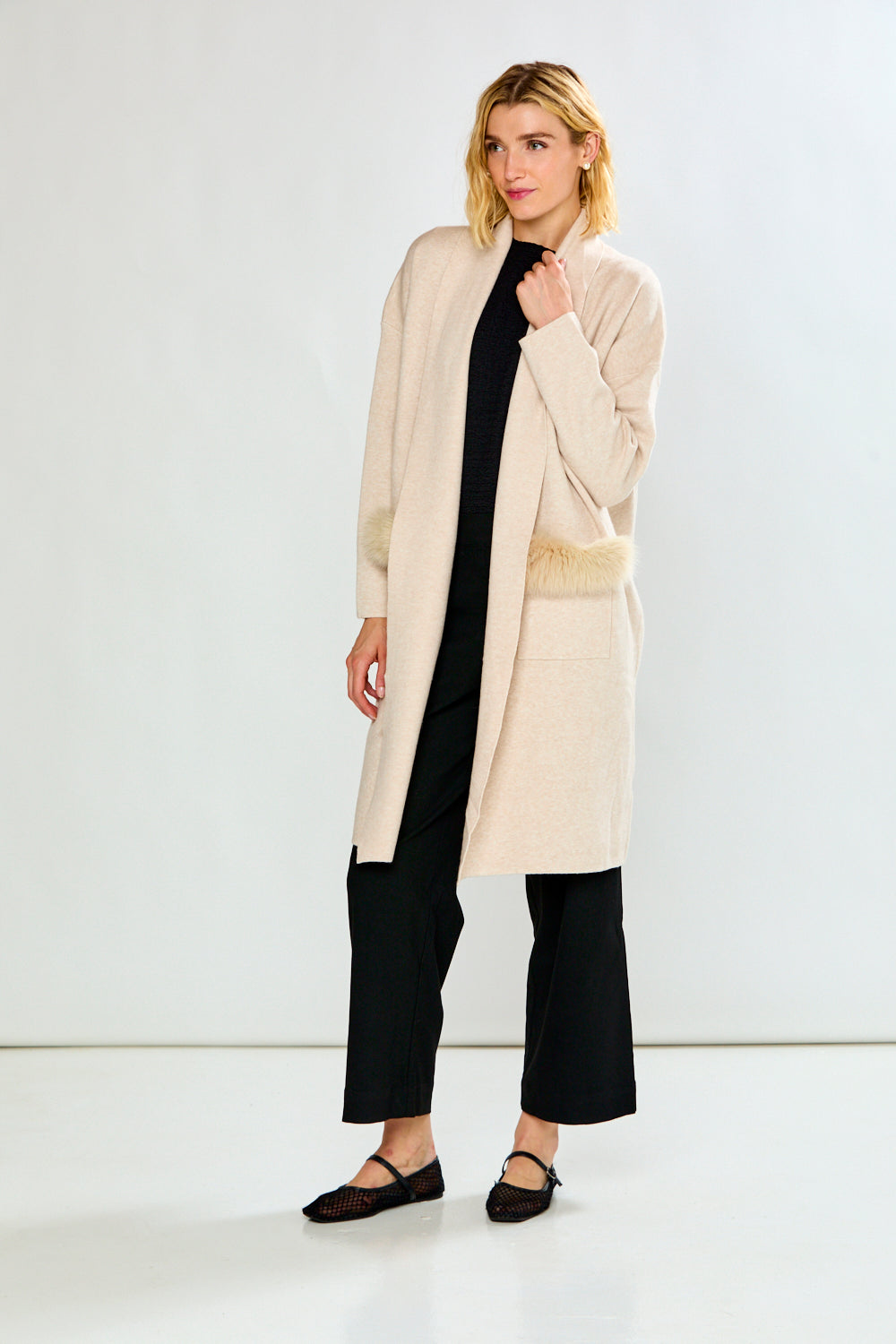 The Knit Cardigan with Sleeves, Pockets with a Faux Fur Trim