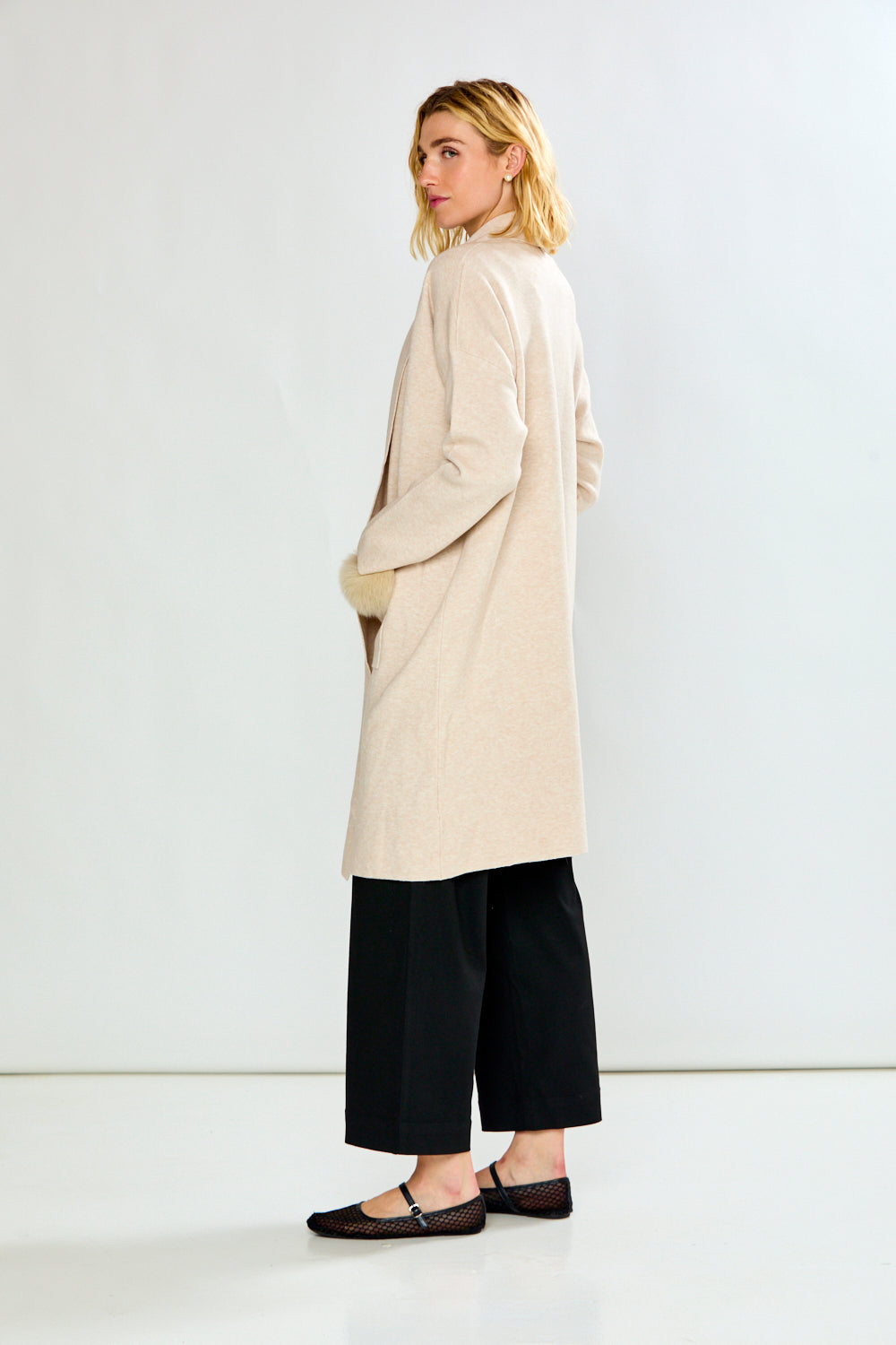 The Knit Cardigan with Sleeves, Pockets with a Faux Fur Trim