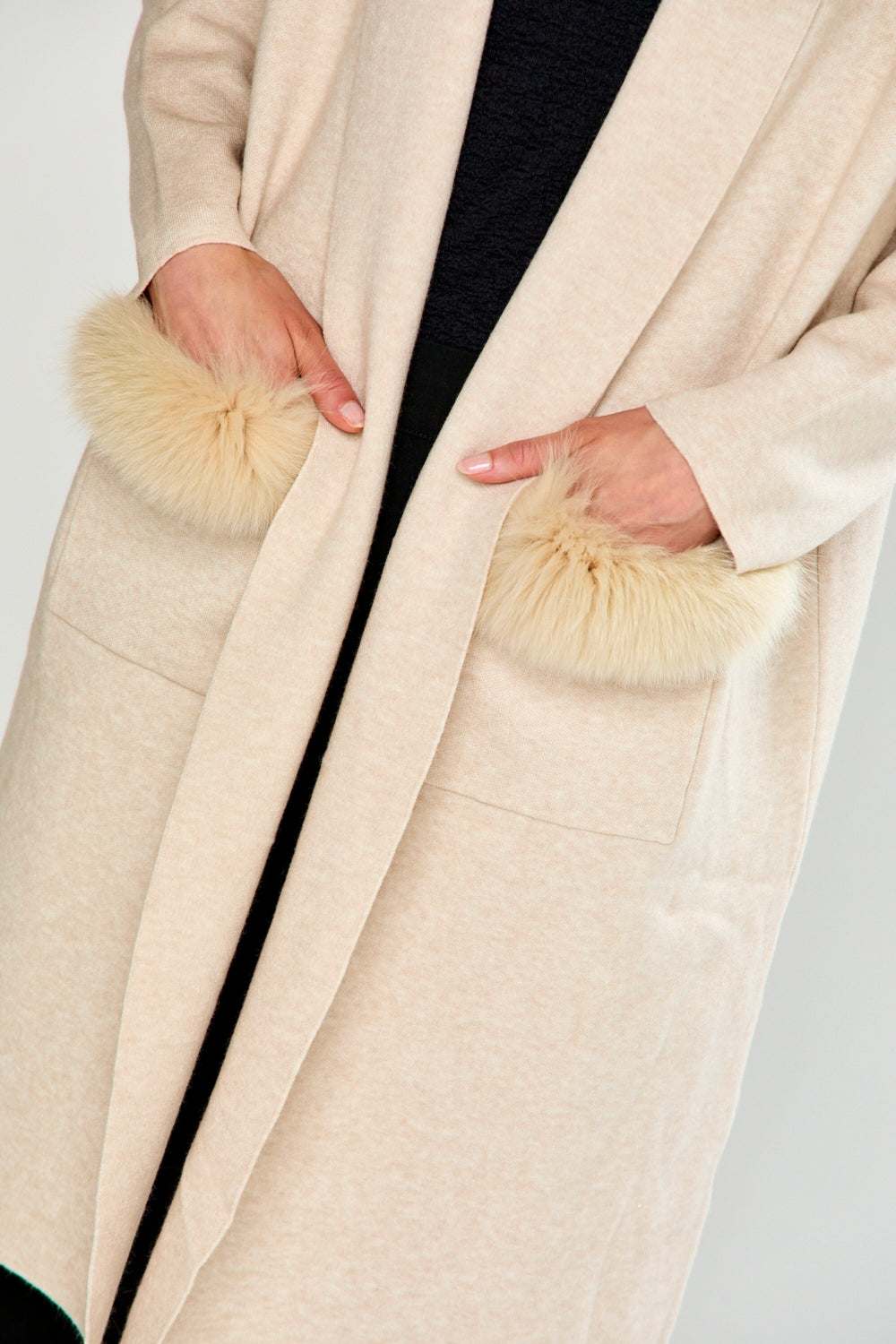 The Knit Cardigan with Sleeves, Pockets with a Faux Fur Trim