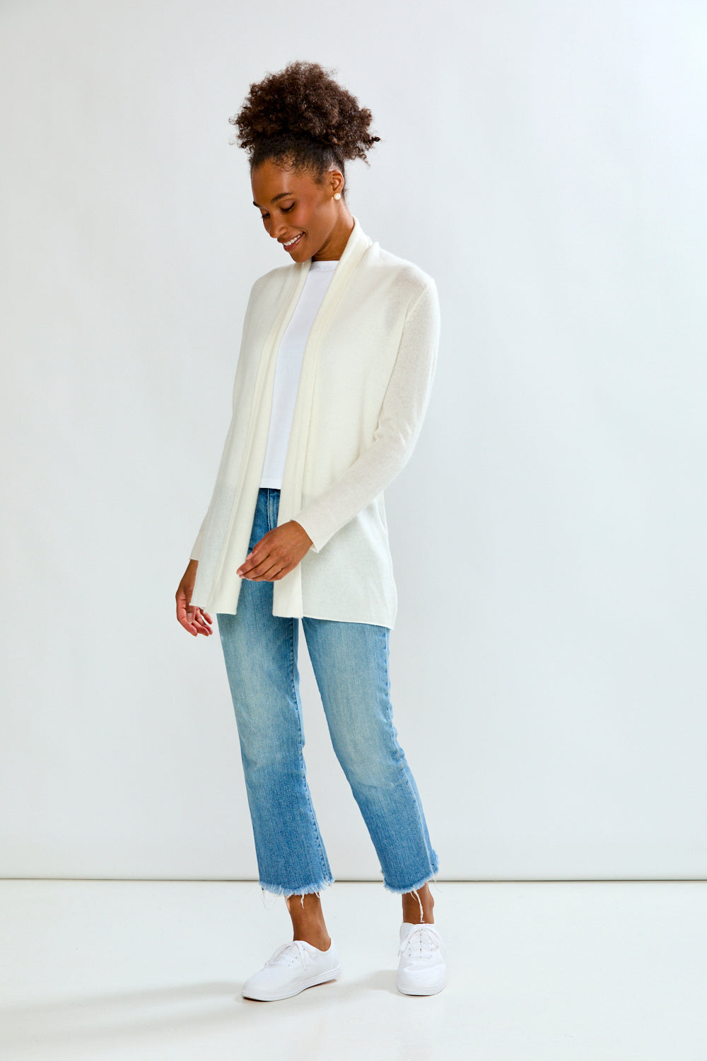 woman in white sweater