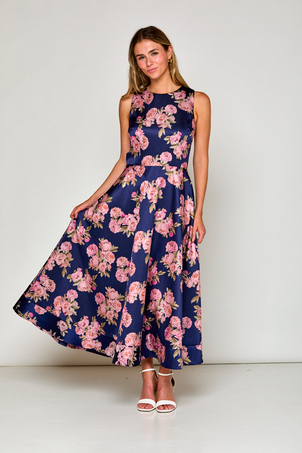 Woman in navy floral dress