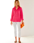 Woman in pink linen tunic