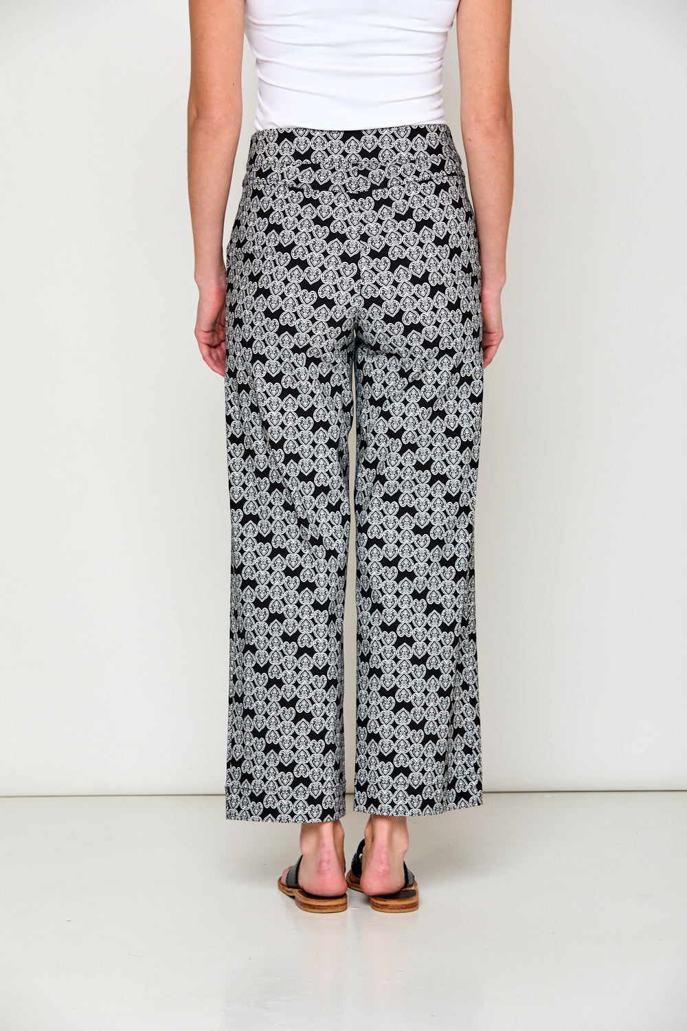 Woman in black and white print pants