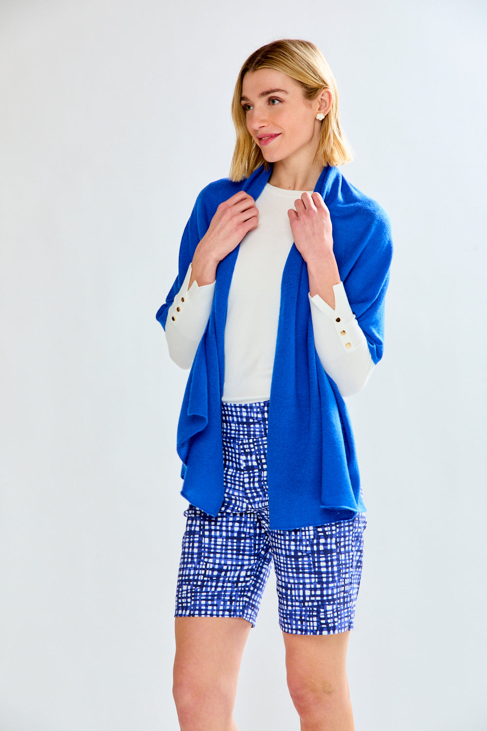 Woman in blue pattern shorts