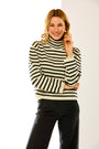 woman in black and white striped sweater 