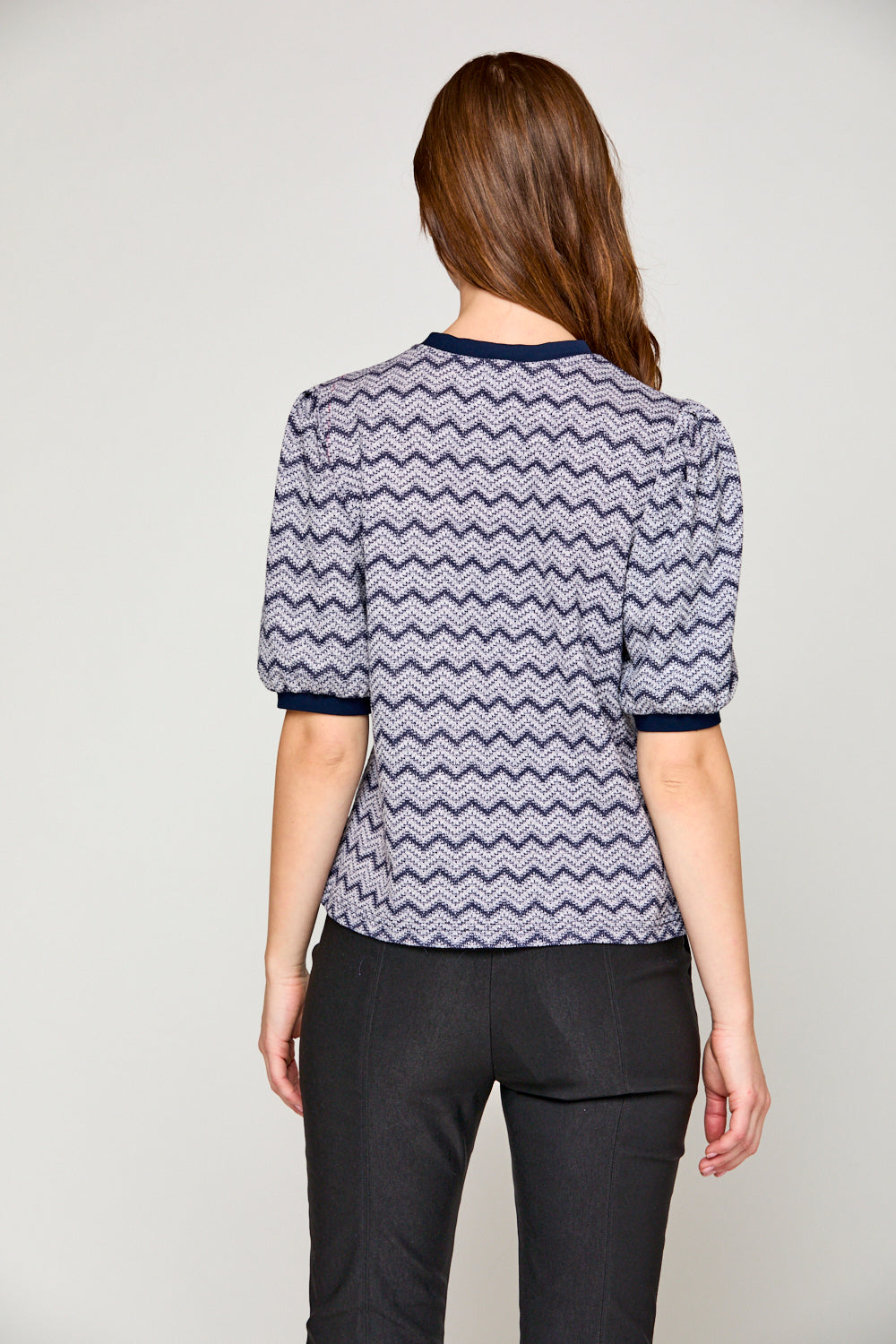 Woman in blue chevron top