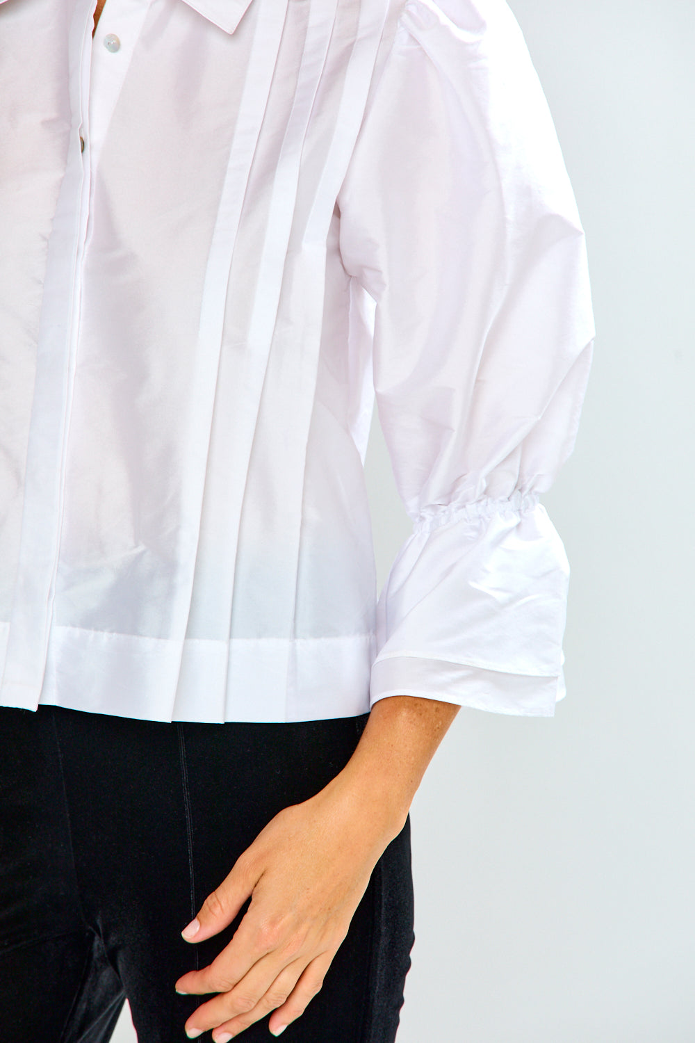 The Arlo Top in Taffeta - White, a sophisticated white collared blouse with pleated detailing and voluminous three quarter sleeves with elastic cuffs