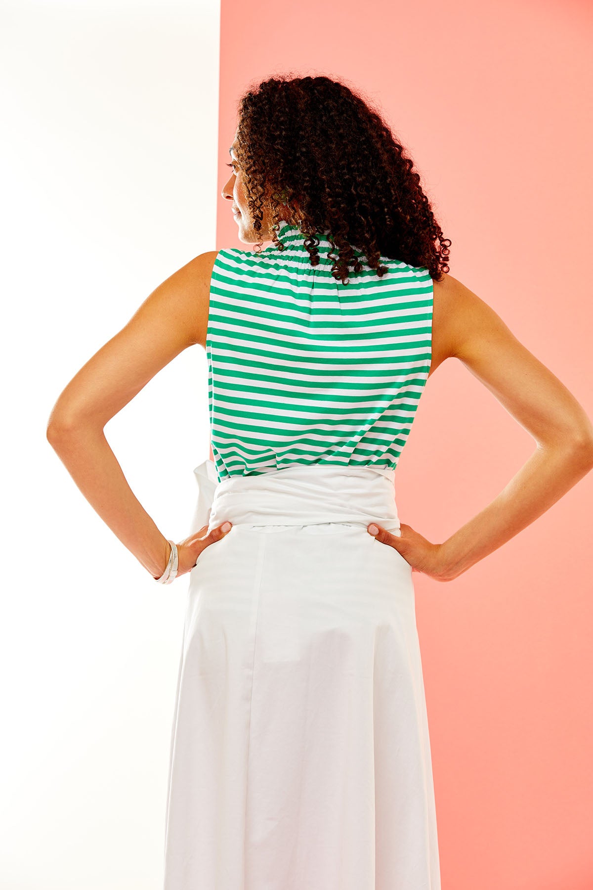 Woman in green stripe knit tank
