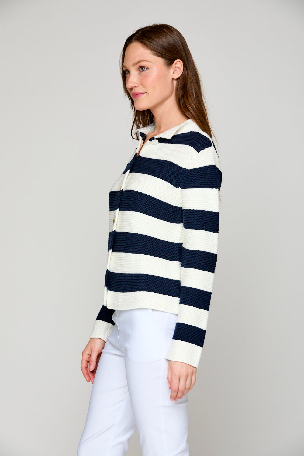 Woman in striped mock neck sweater