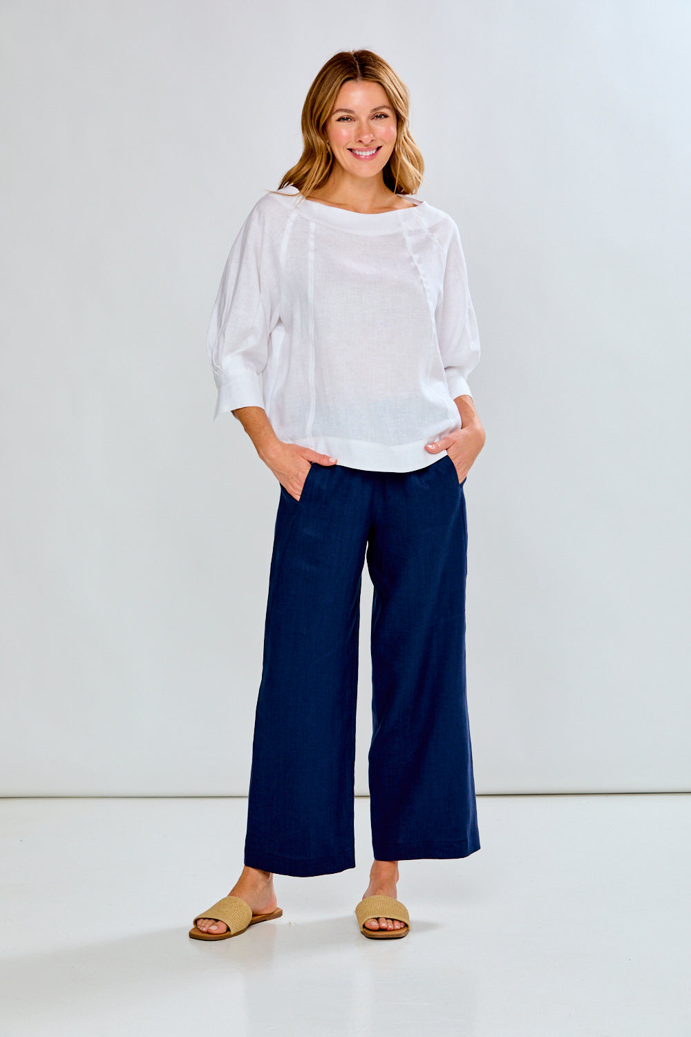 Woman wearing The Alessandra Pant - Navy