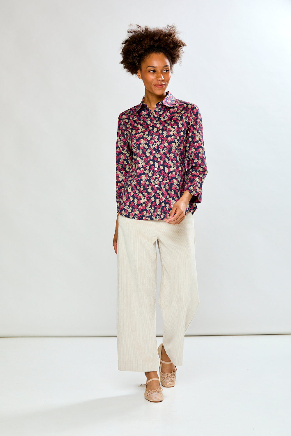 Woman in oyster corduroy pant