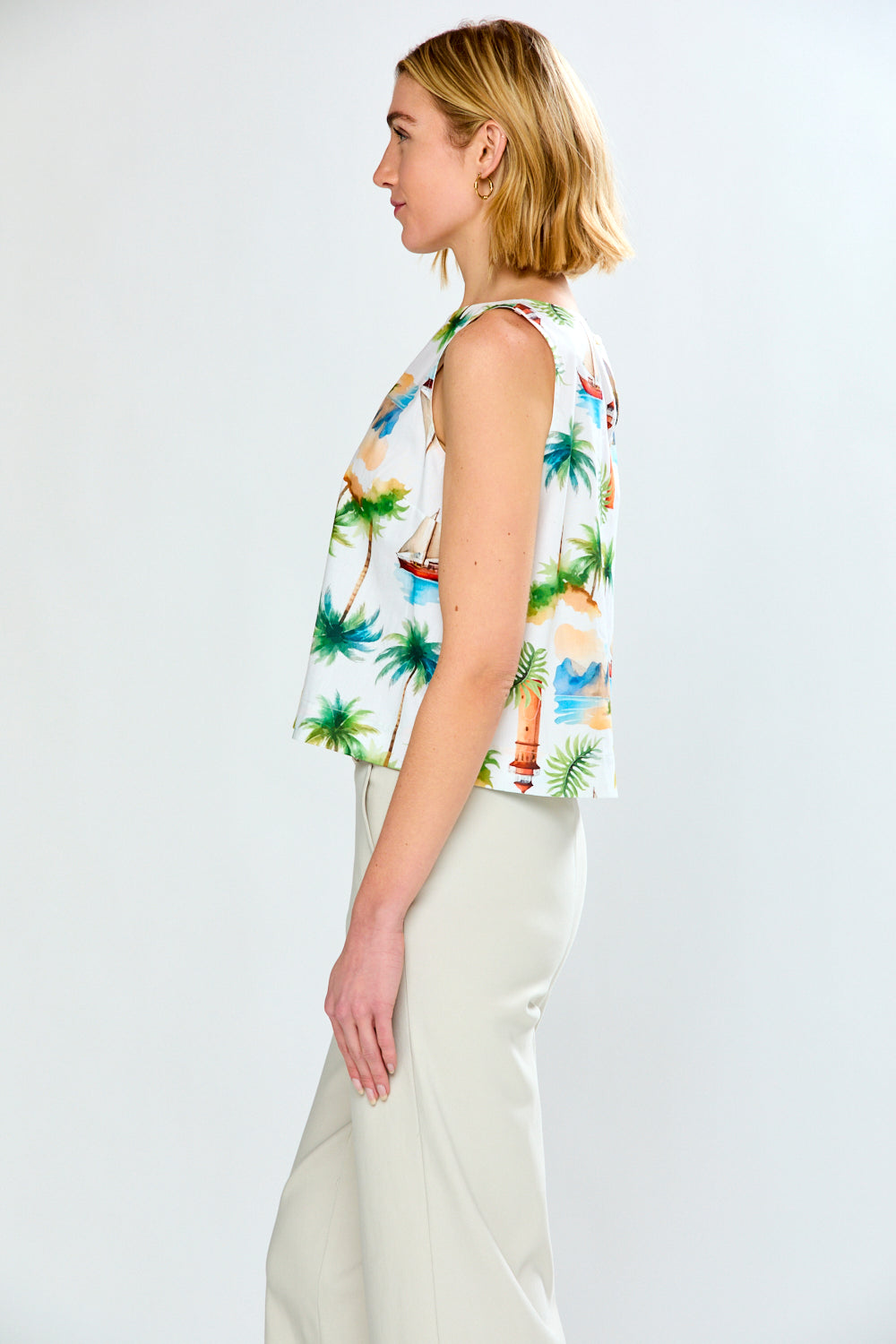 woman in costal boat neck top