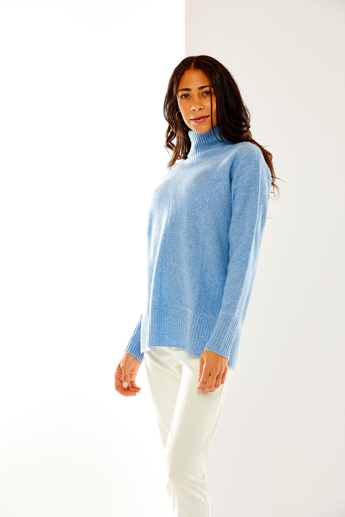 Woman in light denim mix rib tunic