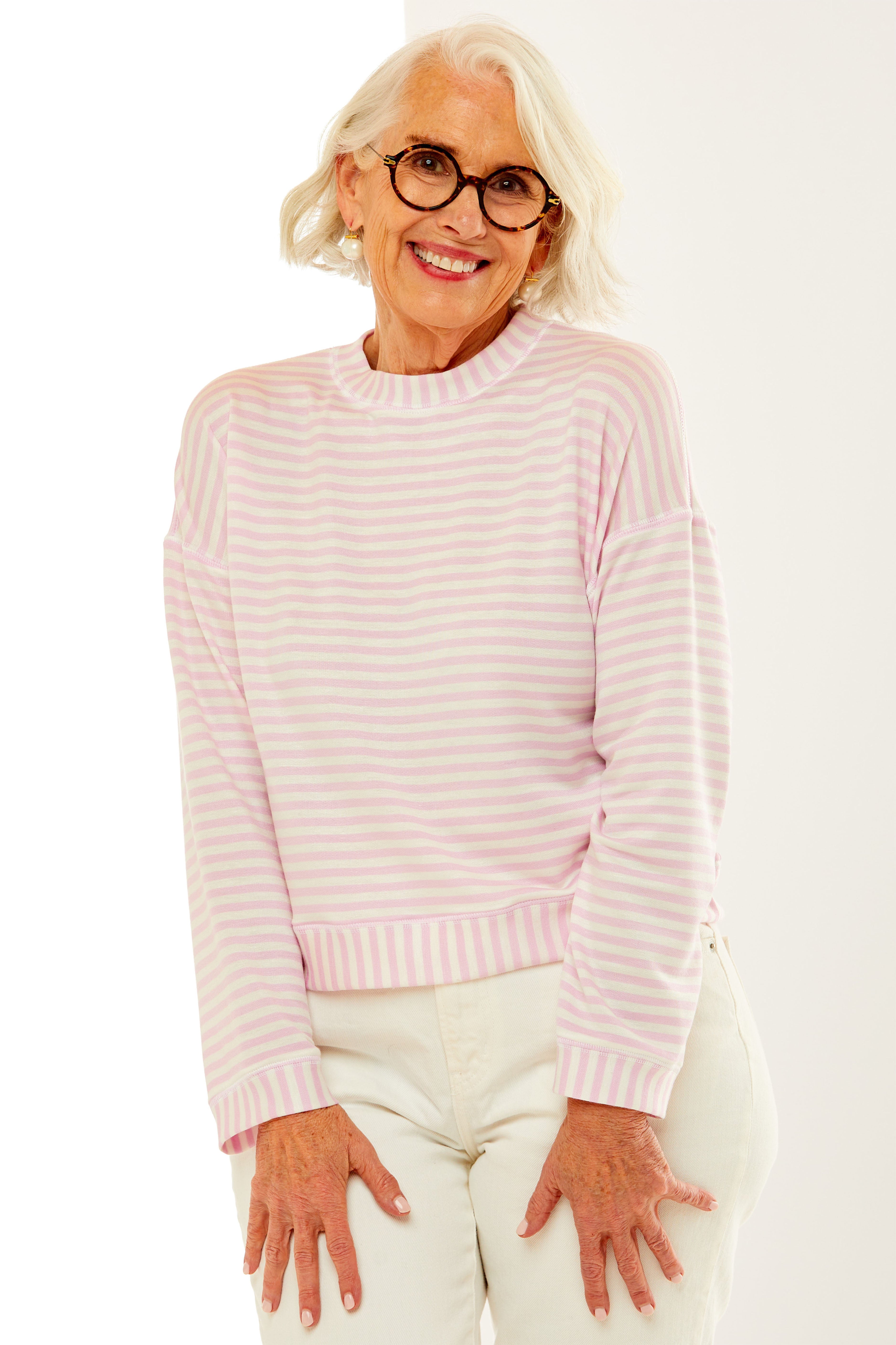 Woman in pink/white stripe top