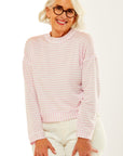 Woman in pink/white stripe top