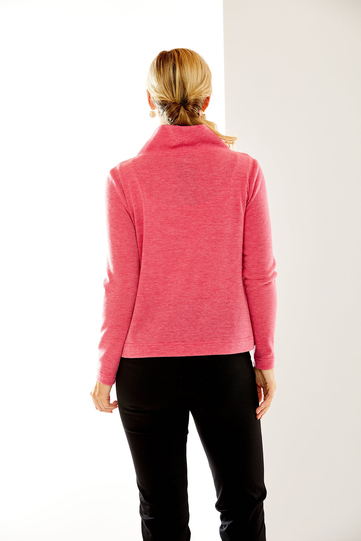 Woman in pink sweater