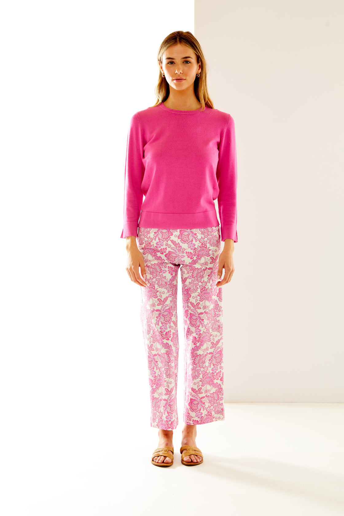 Woman in pink and white printed pant