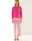 Woman in pink and white printed pant