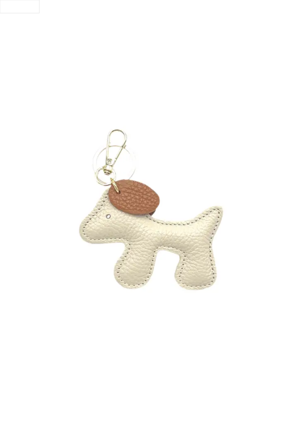 Dog-shaped keychain with a beige tag on a white background