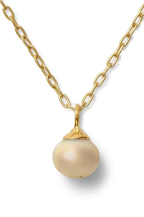The Baby Pebble Pearl Pendant - Biscuit featuring a round cream pearl on a gold link chain for sophisticated timeless women's accessories and jewelry