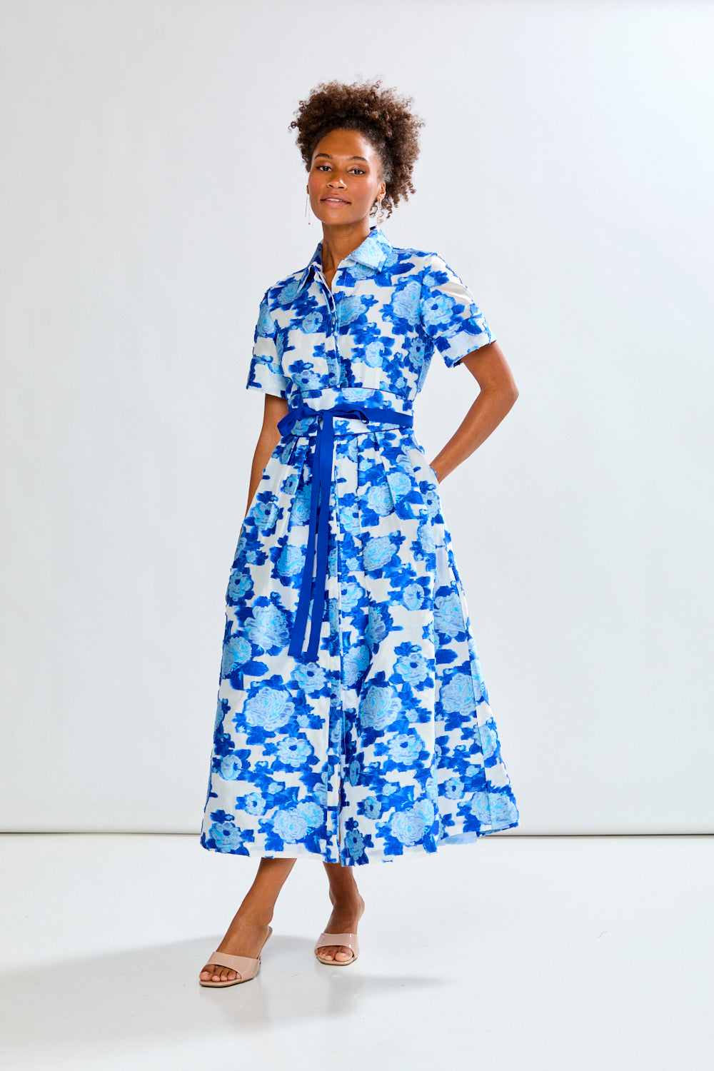 Woman wearing The Marisol Dress in Blue Roses