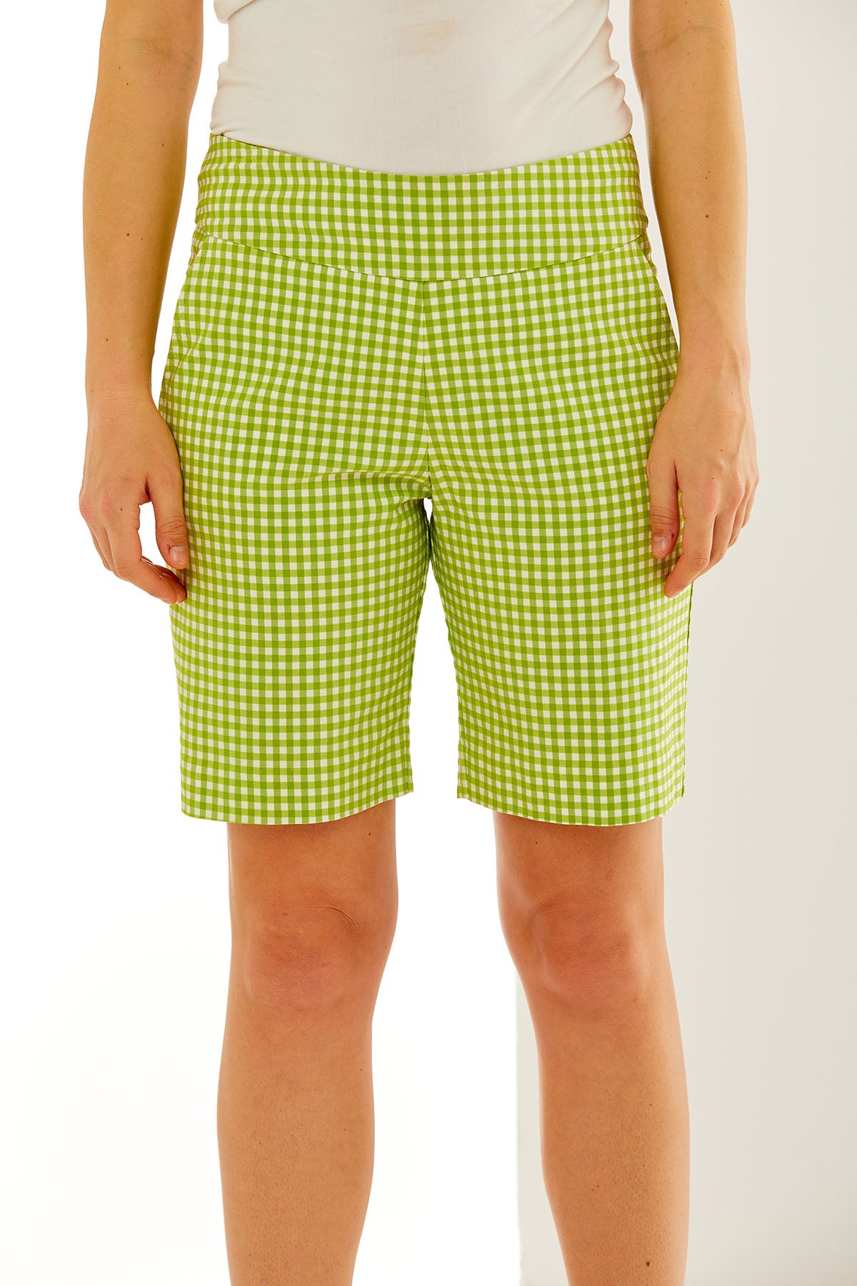 Woman in green and white gingham short