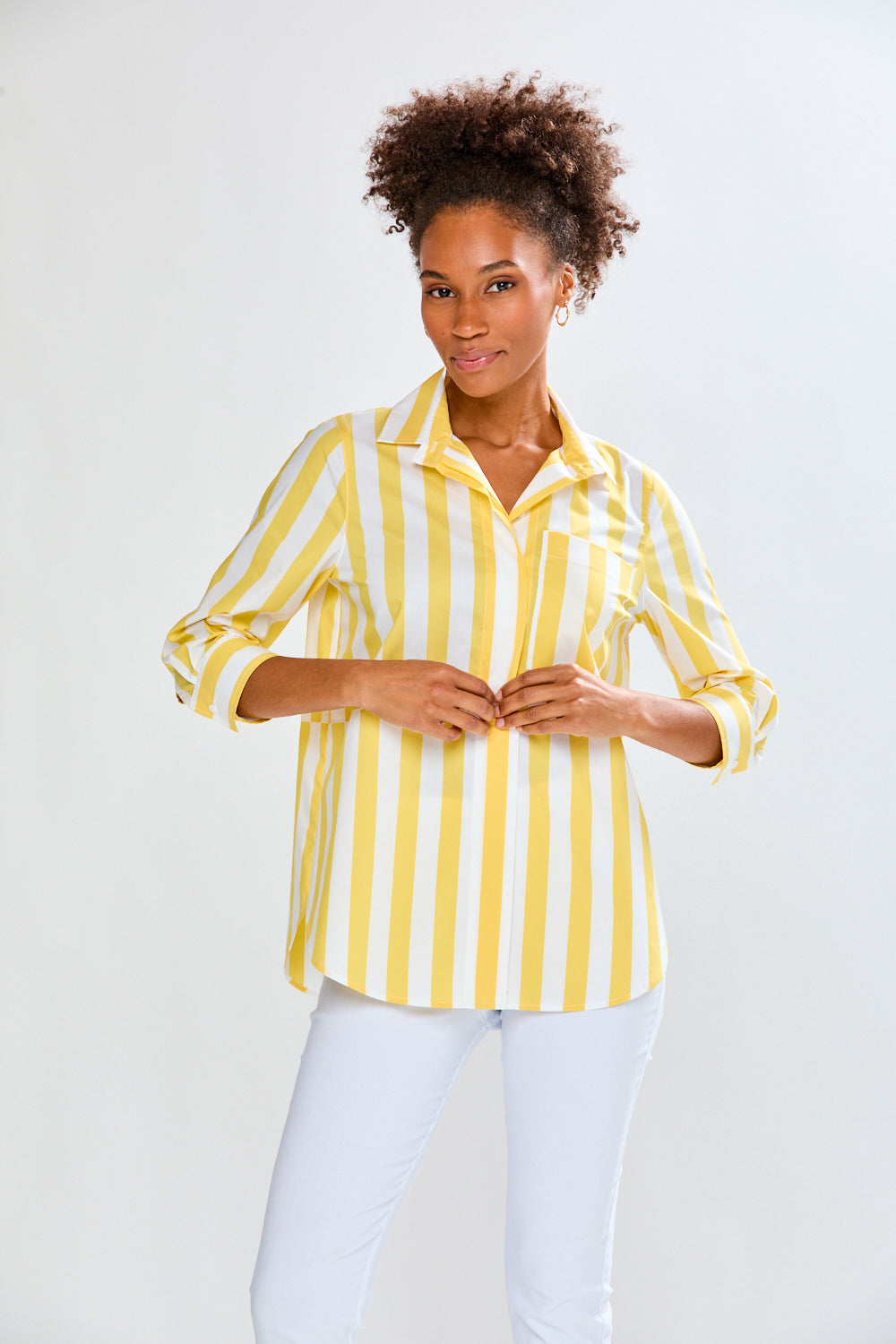 Woman in yellow and white striped top