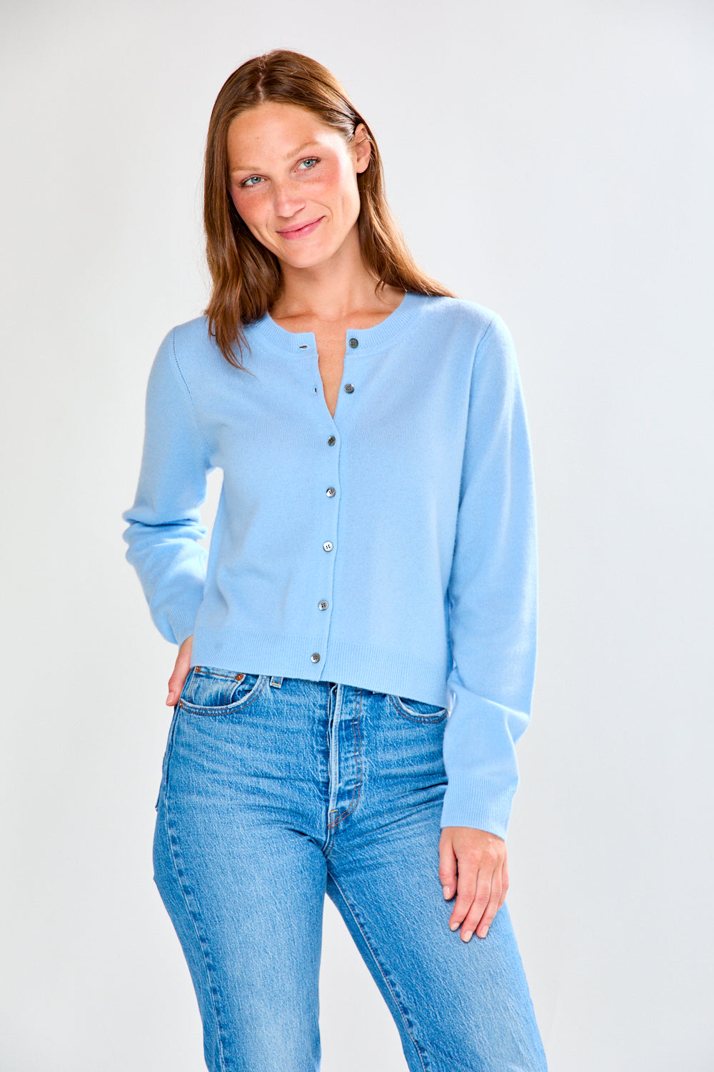 Woman in light blue cashmere sweater