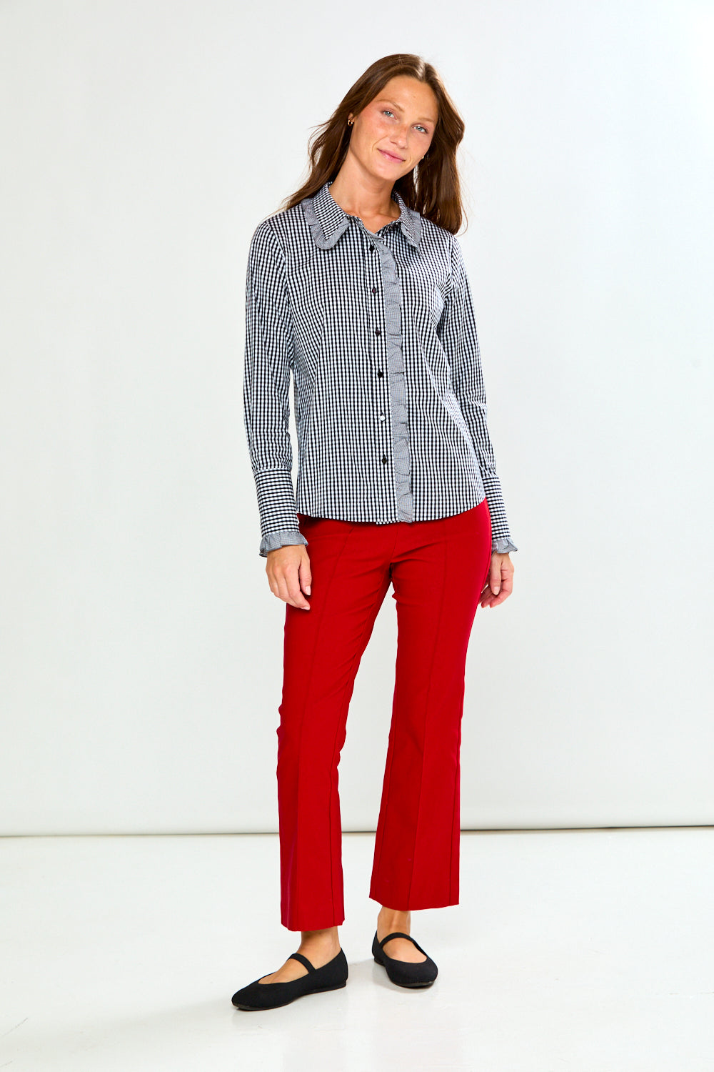 The Mallory Pant - Red, red women's pants styled with a checked button front blouse and black flats for a chic classic look